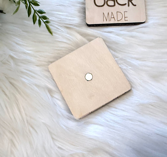 High powered magnet flush to back holds strong.