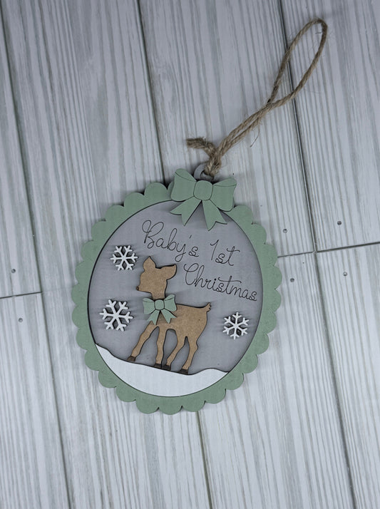 Decorative Christmas tag with a deer design on a wooden surface