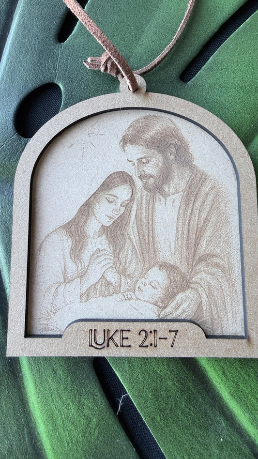 Close-up of Jesus is Born ornament showing handcrafted nativity detail and premium quality, Christian Christmas decoration with inspirational story card