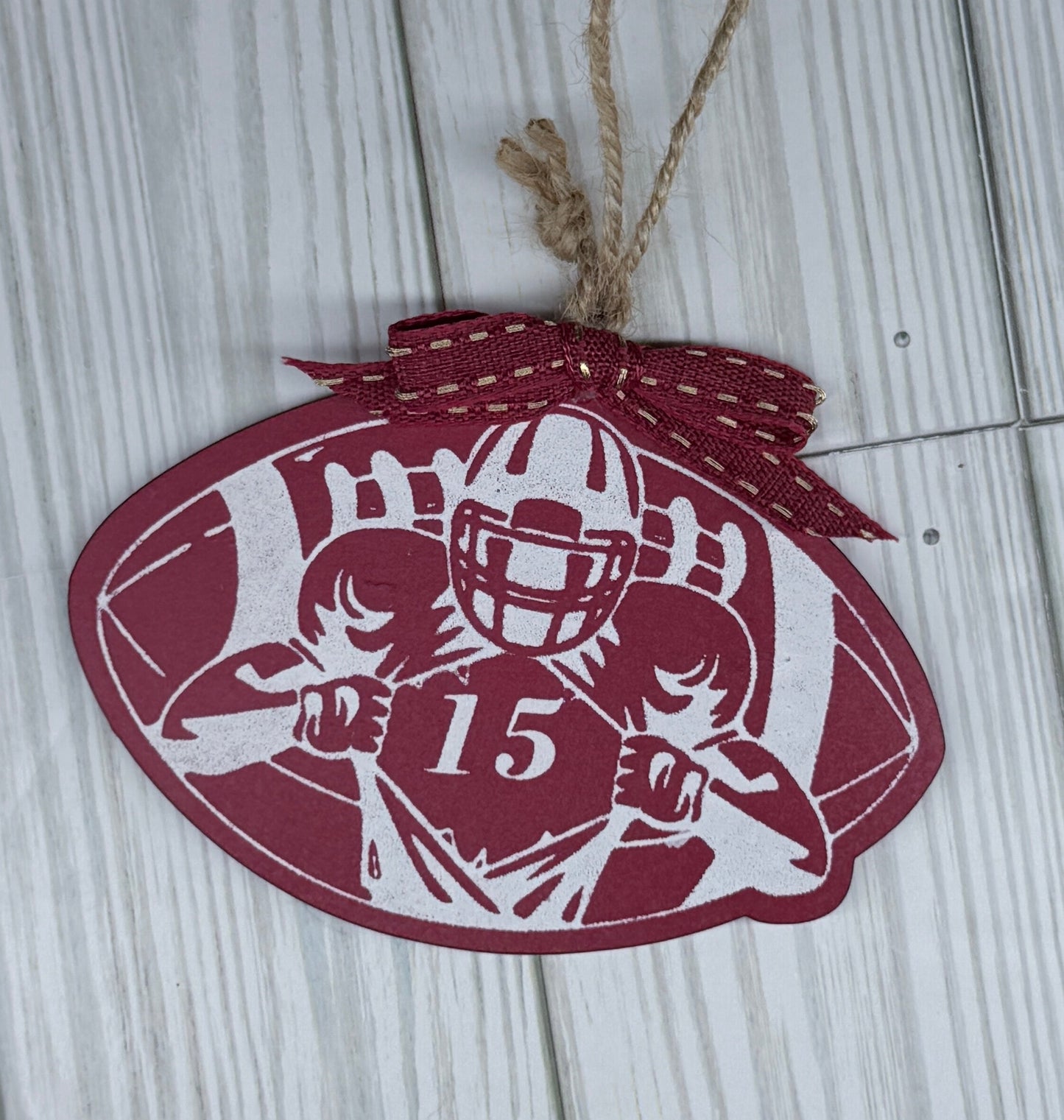 #15 KC Chiefs Patrick Mahomes Red and White Painted football design on a wooden surface. Jute hanger and red & Gold bow.