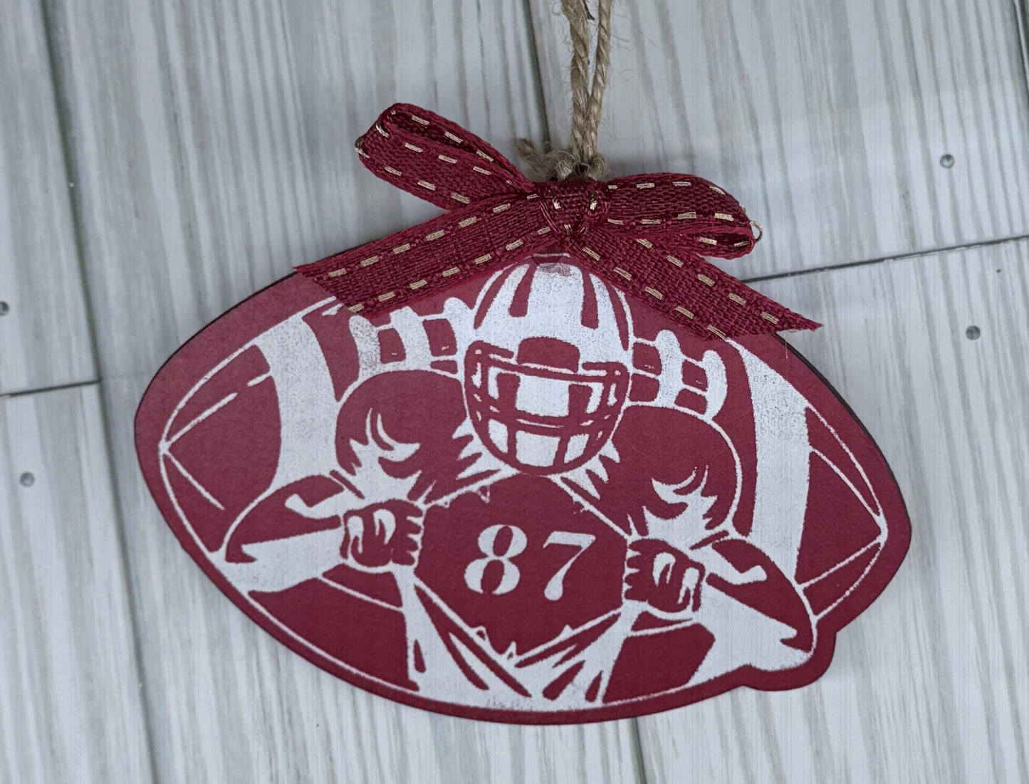 #87 Tavis Kelce football ornament.  