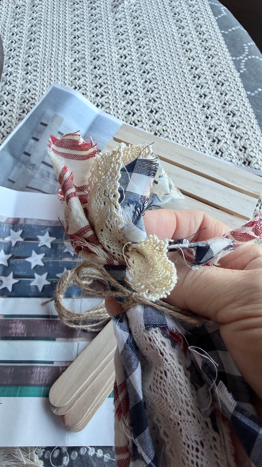 DIY Americana flag kit contents - unfinished wood pallet boards, stars, ribbons and jute cord"