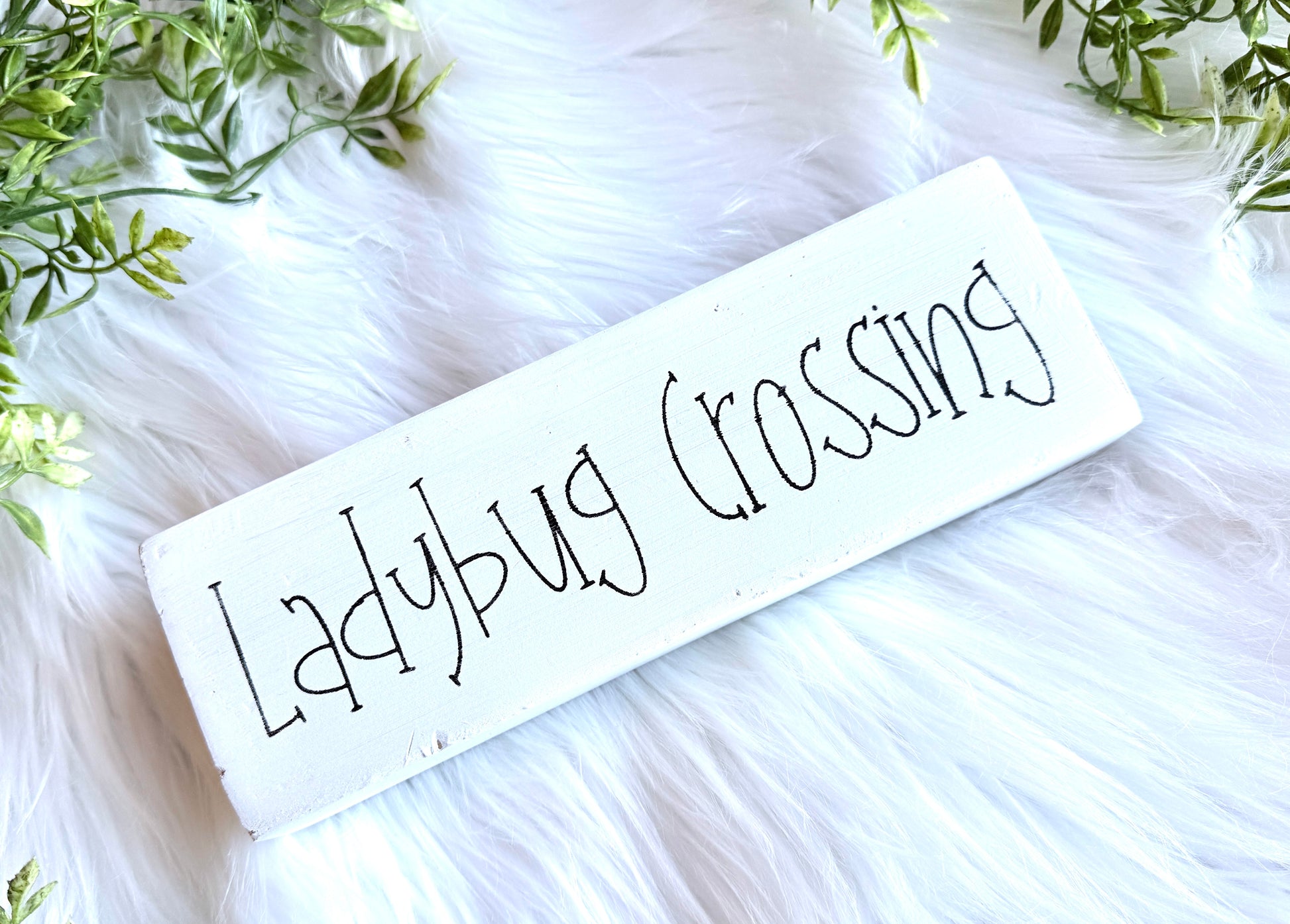 "Rustic White wooden Ladybug Crossing shelf sitter sign 3x9 inches - garden-themed home décor"