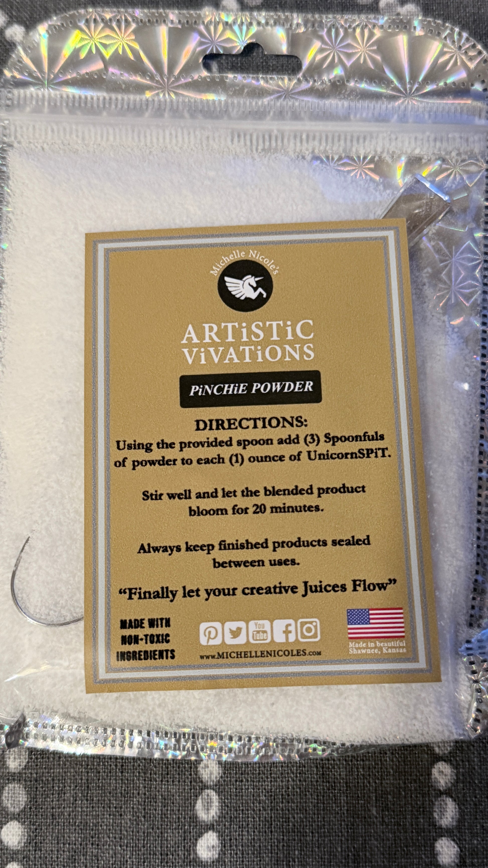 Close up of front package of Pinchie Powder